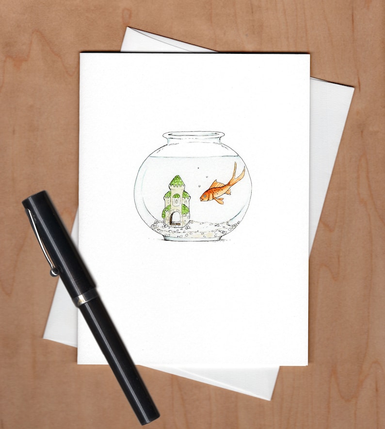 May include: A watercolor illustration of a goldfish swimming in a round glass bowl with a small green castle inside. The bowl is on a white background.