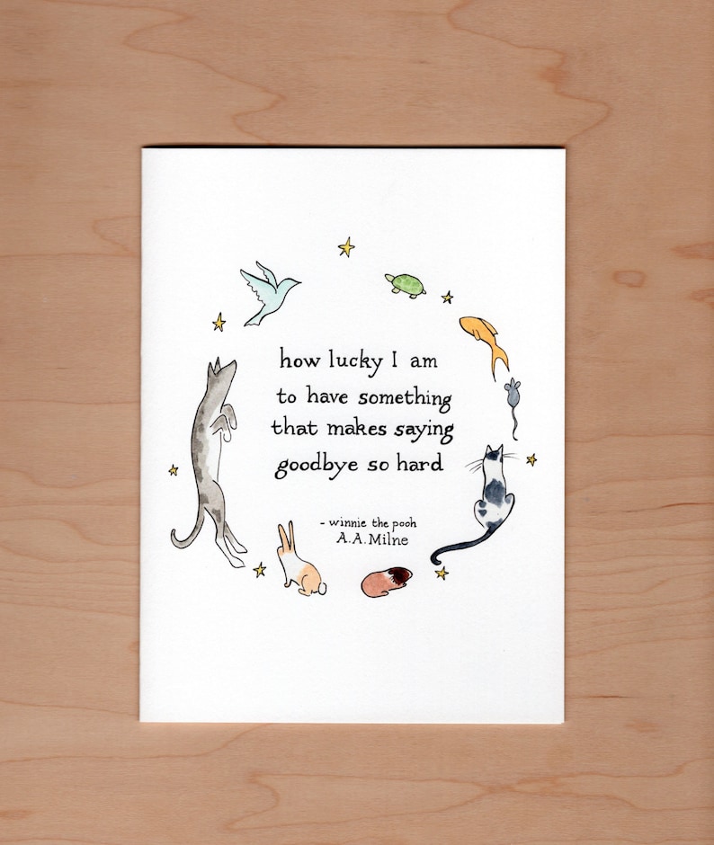 front of illustrated pet sympathy card; different animals and stars surround a winnie the pooh A.A. Milne quote reading how lucky I am to have something that makes saying goodbye so hard.