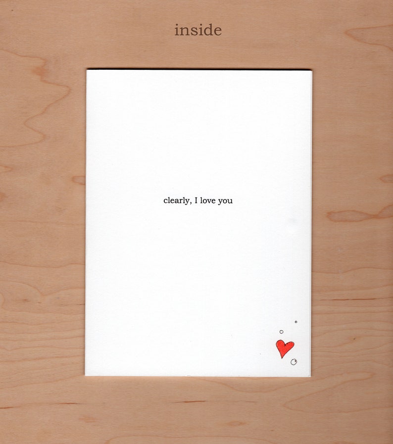 Inside of card:  message reads "clearly, I love you".  A little illustration of a heart and bubbles in the bottom right corner
