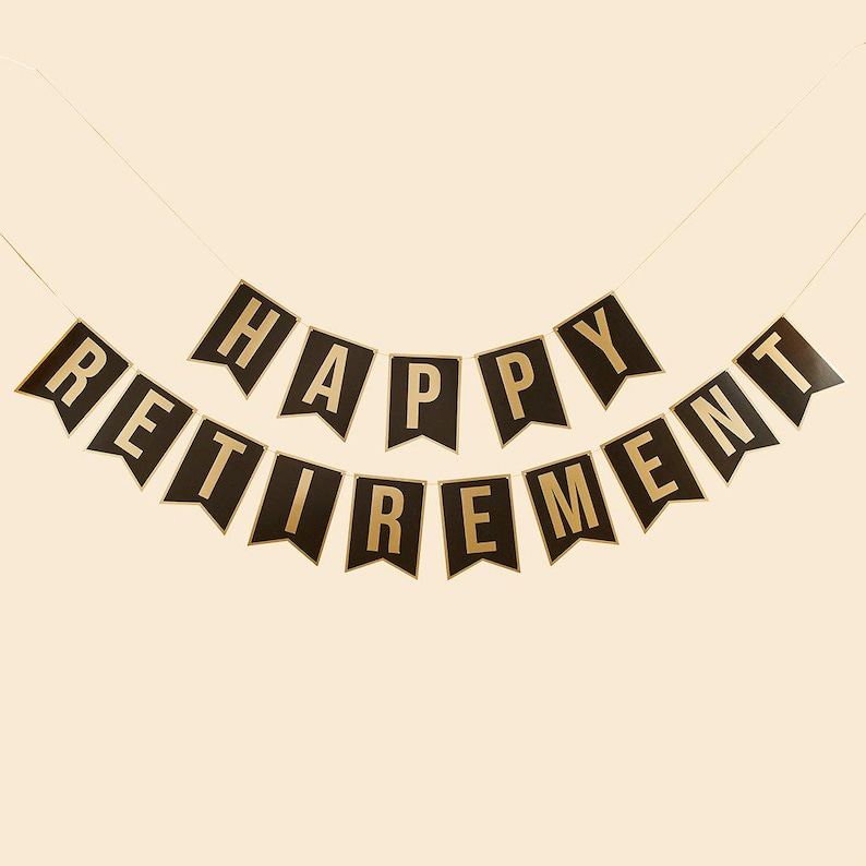 May include: Black and gold banner with the text "Happy Retirement" in gold letters.