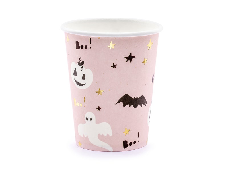 May include: A pink paper cup with a white interior, decorated with Halloween-themed illustrations. The design includes a jack-o'-lantern, a ghost, a bat, stars, and the word "Boo!" in black and gold. Perfect for Halloween parties.
