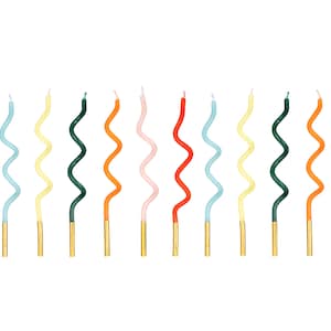 May include: Eleven colourful, wavy birthday candles. Each candle is a different colour, including red, blue, yellow, green, orange, and pink. The base of each candle is gold.