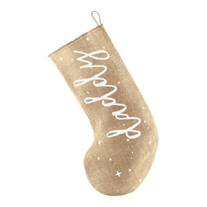 May include: A beige burlap Christmas stocking with white stars and the word "Merry" written in a cursive font.
