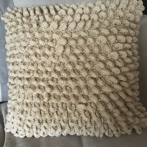 Hand knitted vanilla cream Loopy Lou Aran cushion cover