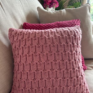 Hand knitted rose pink smocked rib pattern Aran cushion cover