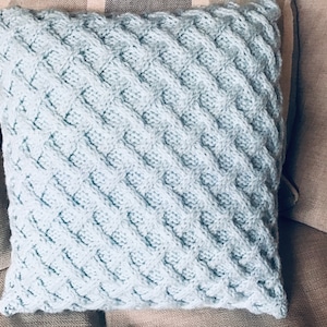 Hand knitted aqua blue raised diamond pattern Aran cushion cover