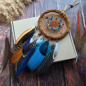 Handmade Blue and Brown Dreamcatcher – Boho Wall Hanging with Natural Feathers and Gemstones, Rustic Home Decor, Nature-Inspired Gift
