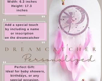 May include: A pink and white dreamcatcher with a fairy silhouette and the name "Marisa" written on it. The dreamcatcher is 6.3 inches wide and 17.3 inches tall. It is decorated with pink feathers and beads. The text "DREAMCATCHER Personalized" is written below the dreamcatcher.