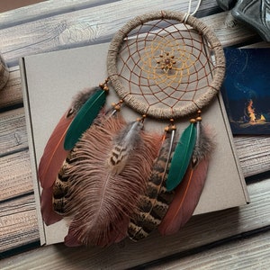 Premium Vector | Dream Catcher And Crossed Arrows Tribal Legend In Style Dreamcatcher With Bird Feathers Beads 34842826