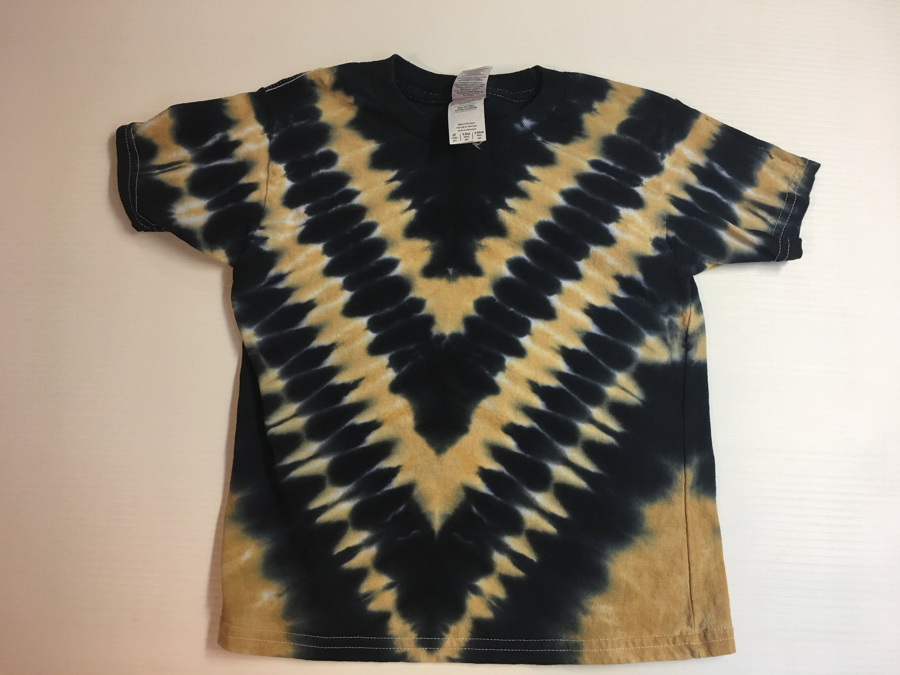 Black and gold hotsell tie dye shirt