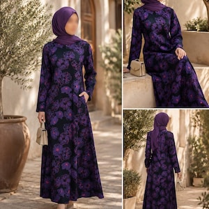 May include: A long-sleeved, floor-length dress in a dark purple and black floral print, featuring a round neckline and side pockets. The garment is paired with a matching solid purple headscarf and a small, structured beige handbag.