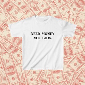 Need Money Not Boys Baby T-shirt | Y2K Meme Tee | Funny Retro Gift | 90s Adult T-shirt | Iconic Slogan Vintage Baby Tee