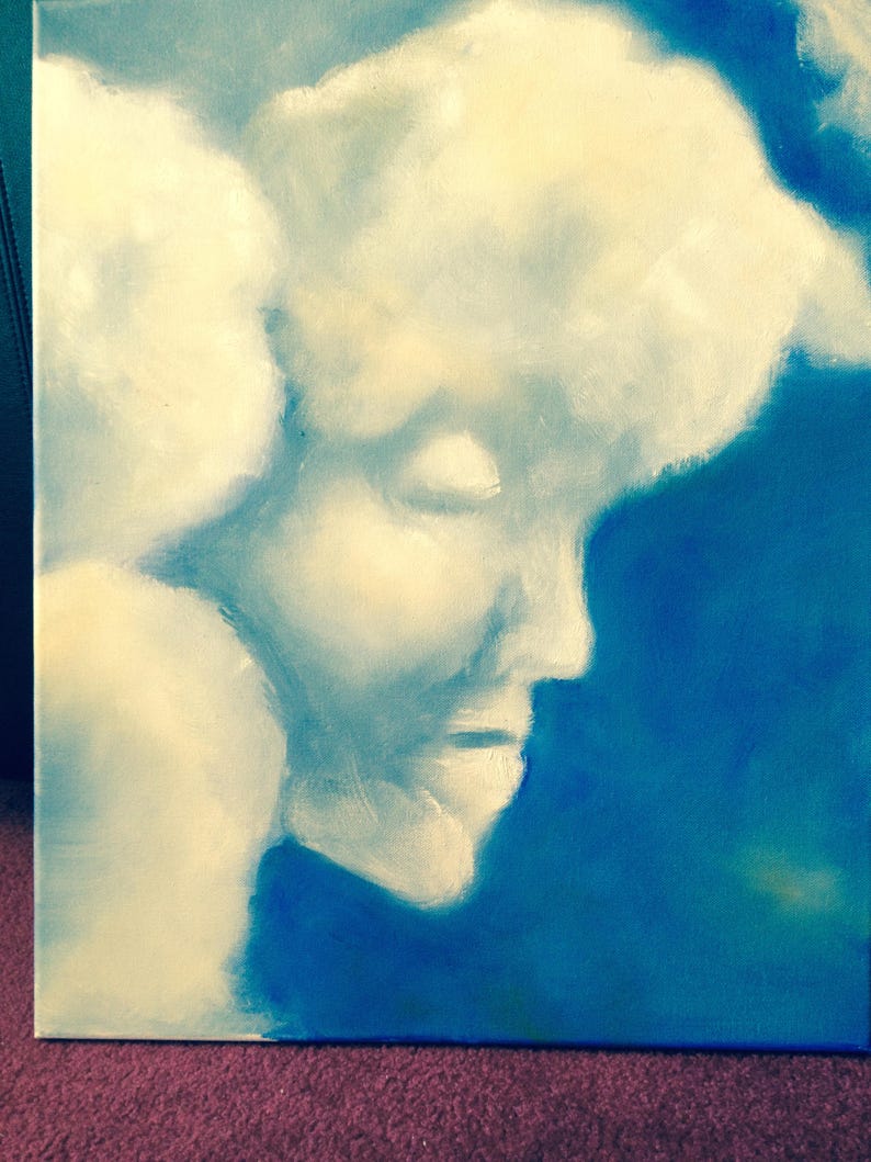 May include: Abstract painting of a face with a white and blue color scheme. The face is painted in a soft, dreamy style, with a focus on the eyes and mouth.