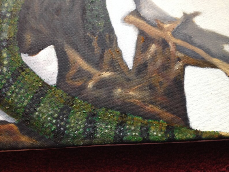 May include: Close-up of a painting depicting a tree trunk with a green, textured surface. The trunk is partially covered in brown branches and the background is white.