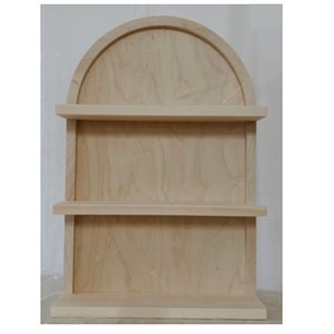 Curved wooden bookshelf- shelf at very bottom