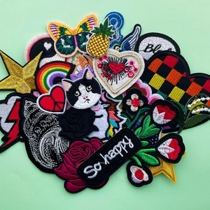 Surprise pack of patches which can be either ironed on or sewn on.  Fun christmas gift for all ages.