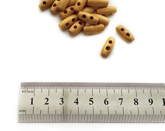 100 boutons à bascule 15 mm x 7 mm - Bascules en bois brun doré - Grossistes en gros de boutons - 5/8 po. de longueur