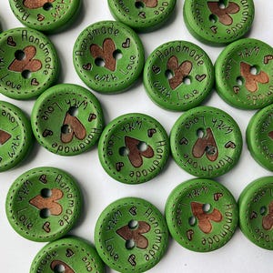 Mixed colour pack of heart buttons for detailing handmade purses, clothes, and accessories. these are an intense green, grass green colour