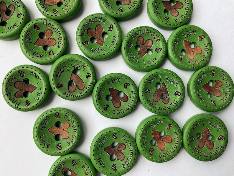Mixed colour pack of heart buttons for detailing handmade purses, clothes, and accessories. these are an intense green, grass green colour