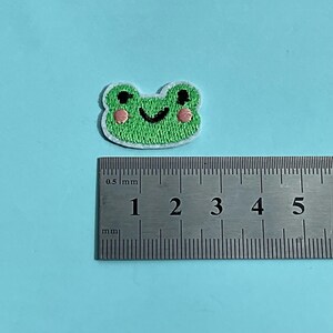 Micro patch in shap of green frog