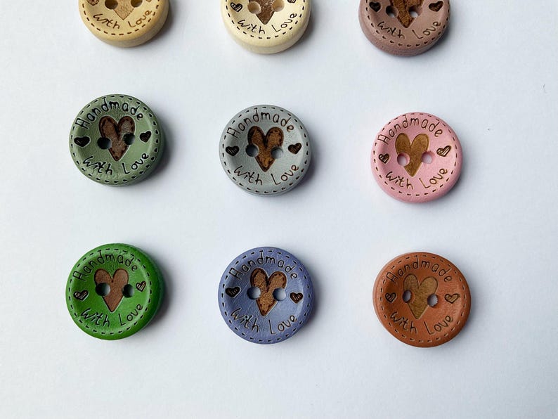 Dusky pink and sage green wood buttons with 2 holes for crochet crafts.