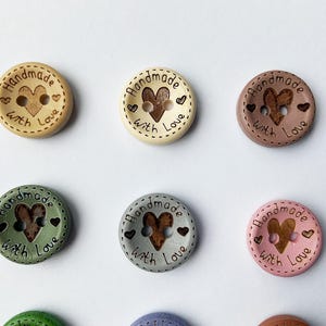 Intense green and chocolate brown rustic buttons for garment finishing.