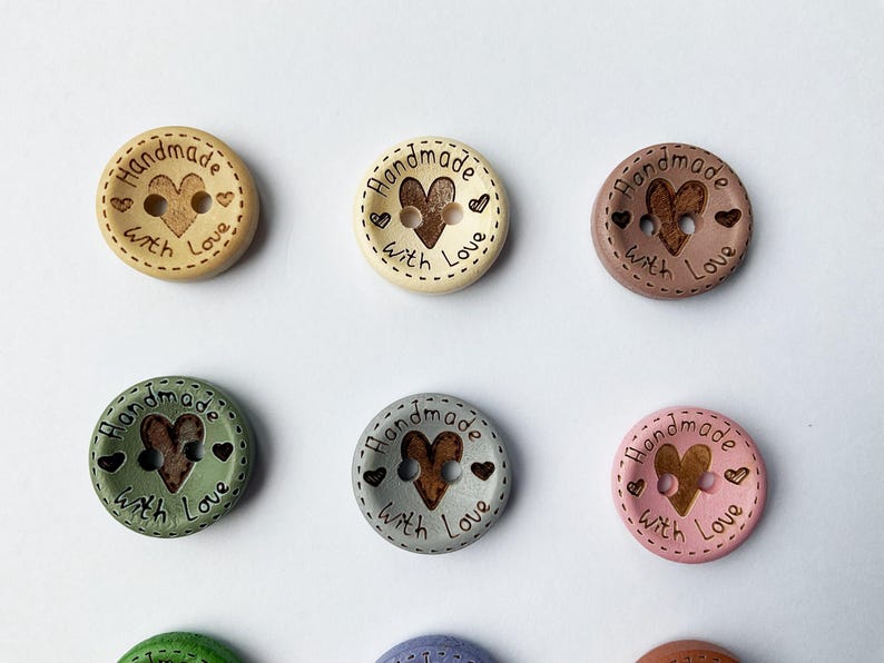 Intense green and chocolate brown rustic buttons for garment finishing.