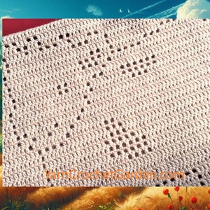May include: A close-up of a crocheted blanket with a diamond pattern in a light beige colour. The blanket has a delicate, openwork design with small holes throughout. The text "YarnCrochetGarden.com" is visible in the bottom right corner of the image.