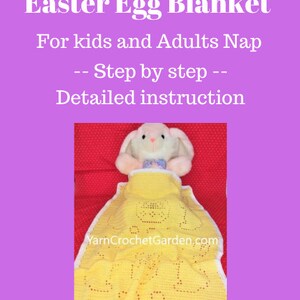 May include: A yellow crochet Easter egg blanket with a bunny rabbit toy inside. The blanket has a white border and a repeating pattern of eggs. The text "YarnCrochetGarden.com" is visible on the blanket.