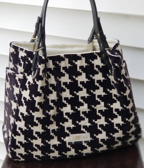 black and cream handbag