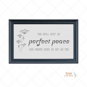 May include: A rectangular black frame containing a cross-stitch pattern on white fabric. The design features a black floral sprig on the left and the text: YOU WILL KEEP IN perfect peace HIM WHOSE MIND IS SET ON YOU in black lettering.