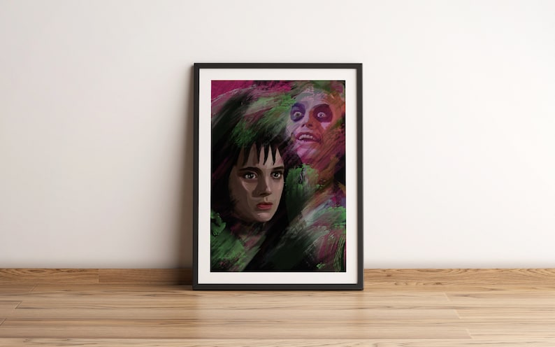 May include: A framed print of a colorful, abstract painting featuring two faces. The faces are partially obscured by brushstrokes and appear to be a woman with dark hair and a man with a sinister expression.