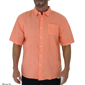 May include: A peach colored linen shirt with a button-down collar and a single chest pocket.
