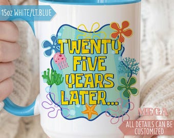 May include: White ceramic mug with a light blue interior and handle. The mug features the text "TWENTY FIVE YEARS LATER..." in yellow, surrounded by cartoon sea-themed graphics. The mug holds 15oz.