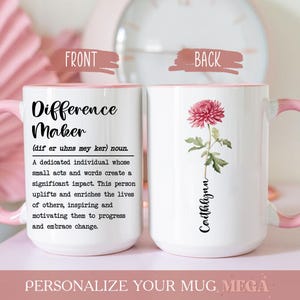 May include: White ceramic mug with a pink interior and handle. The front features the text "Difference Maker" with a definition. The back displays a pink flower with the name "Caithlynn".
