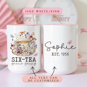 May include: White ceramic mug with a pink interior and handle. The left side features a floral tea cup design with the text "SIX-TEA years young". The right side has the name "Sophie" and "EST. 1956". The text "ALL TEXT CAN BE CUSTOMIZED" is at the bottom.
