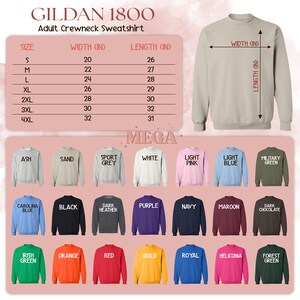 K&ouml;nnte beinhalten: Eine Gr&ouml;&szlig;entabelle f&uuml;r Gildan 1800 Erwachsenen-Sweatshirts mit Rundhalsausschnitt, die die Breite und L&auml;nge in Zoll f&uuml;r die Gr&ouml;&szlig;en S bis 4XL zeigt.  Unter der Tabelle befinden sich 24 Farbmuster von Sweatshirts, darunter Asche, Sand, Sportgrau, Wei&szlig;, Hellrosa, Hellblau, Milit&auml;rgr&uuml;n, Carolina-Blau, Schwarz, Dunkelgrau, Lila, Marineblau, Weinrot, Dunkelbraun, Irischgr&uuml;n, Orange, Rot, Gold, Royalblau, Heliconia und Waldgr&uuml;n.