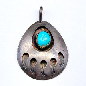 Spilla vintage Navajo Native con cornice a giorno, turchese e argento.