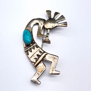 Broche vintage de plata de ley con diseño de kokopelli turquesa del suroeste