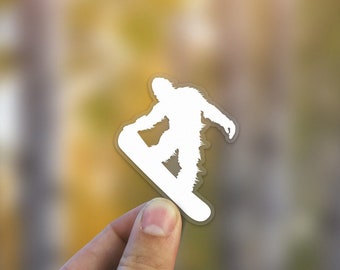 Sasquatch Shredding on a Snowboard Clear Die Cut  Sticker - high quality, weatherproof, bigfoot illustration