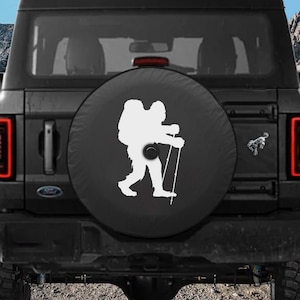 Spare Tire Cover Sasquatch Backpacking, Ford Bronco, Jeep, USA-made, Marine Grade Vinyl, Camera Hole Available