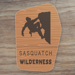 Sasquatch Rock Climbing Wilderness Sign  Sticker - high quality, weatherproof, bigfoot illustration