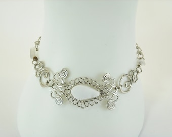 Intricate Dainty Hand Crafted Peruvian bracelet with semi precious stones.