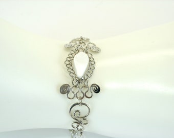 Hand Crafted Peruvian bracelet with semi precious stones.