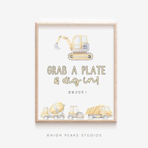 May include: A printable sign with a yellow construction vehicle and the text "Grab a plate & dig in! Enjoy!"  The sign also features three smaller yellow construction vehicles.