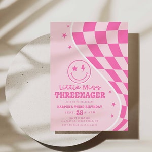 May include: Pink birthday party invitation with a checkered pattern and a smiley face with a lightning bolt. The text reads "Little Miss THREENAGER" and includes the details of the party: "Join us to celebrate Harper's Third Birthday Sept. 25 @ 2PM Smith Home 103 Fast Ln. Great Falls, MT RSVP to Sara @406.183.4567"