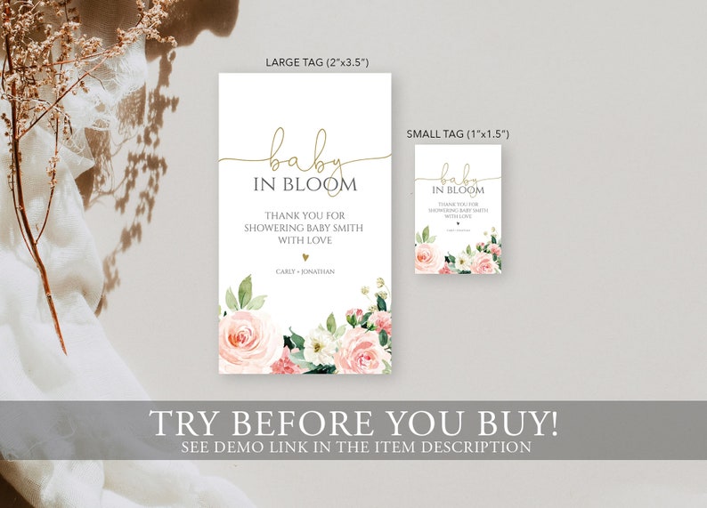 May include: Two printable baby shower tags with a floral design. The larger tag is 2 inches by 3.5 inches and the smaller tag is 1 inch by 1.5 inches. The text on the tags reads "baby in bloom" and "Thank you for showering Baby Smith with love".