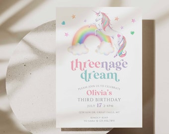 May include: A pink and blue invitation with a unicorn and rainbow illustration. The text reads "threenage dream" and "Olivia's Third Birthday" with the date and time "July 17 2-4PM". The address is "1234 Sun Dr, Great Falls, MT" and the RSVP information is "Kindly RSVP to Sara @ 123.456.7891".