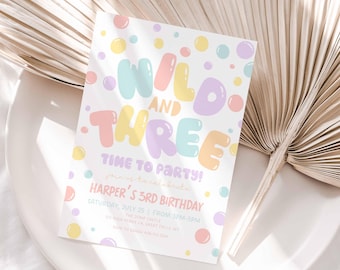 May include: A pastel pink, yellow and blue birthday party invitation with a white background. The invitation says "Wild and Three" with colourful bubble shapes around the text. The invitation also includes the text "Time to Party!" and "Harper's 3rd Birthday".