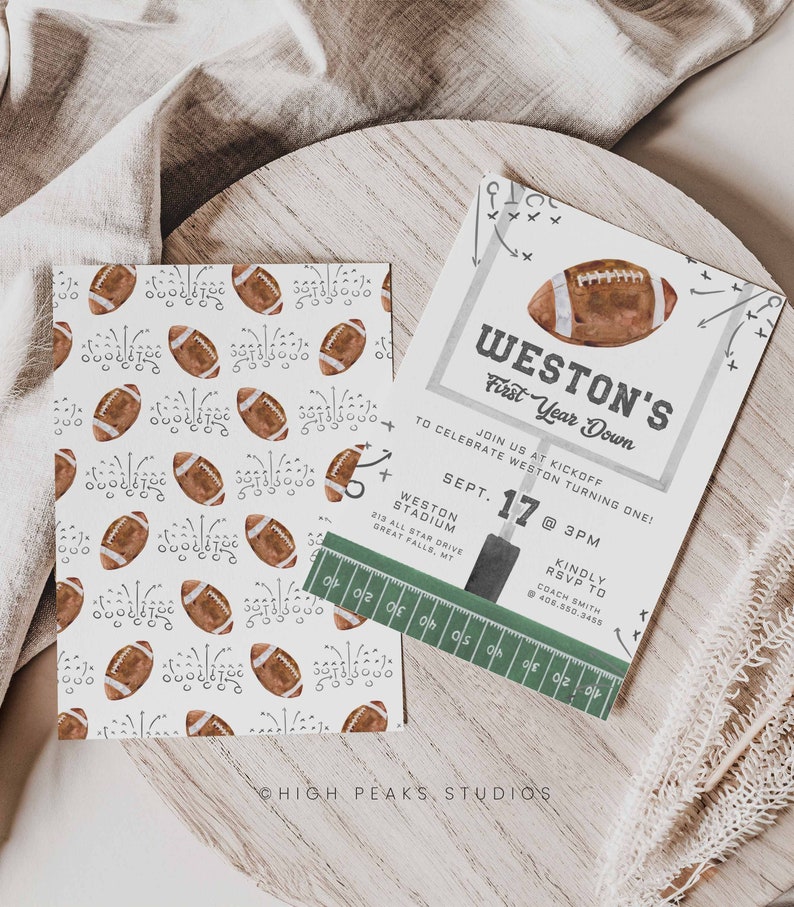 May include: A football-themed invitation for a first birthday party. The invitation features a football field with a football in the end zone. The text on the invitation reads "Weston's First Year Down" and includes details about the party, including the date, time, and location.